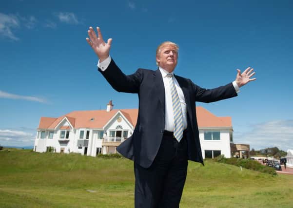 Trump unveils the multi-million-pound refurbishment of the Trump Turnberry clubhouse last year. Picture: John Devlin