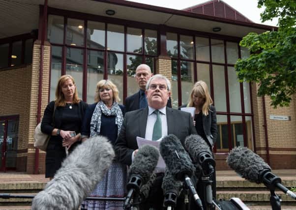 Father of Cheryl James, Des James, speaks to members of the press with other family members including his wife Doreen James (with scarf) behind on June 3, 2016 in Woking, England. Picture: Getty Images