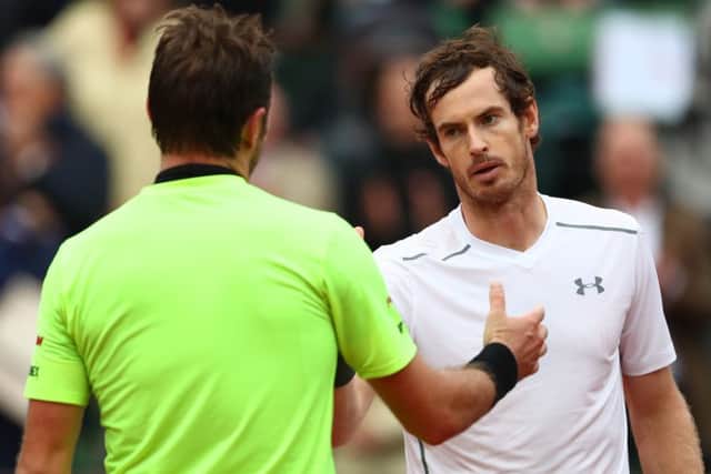 Andy Murray shakes hands with Stan Wawrinka of Switzerland following his victory during the Men's Singles semi final match on day thirteen of the 2016 French Open at Roland Garros on June 3, 2016 in Paris, France. Picture: Getty Images