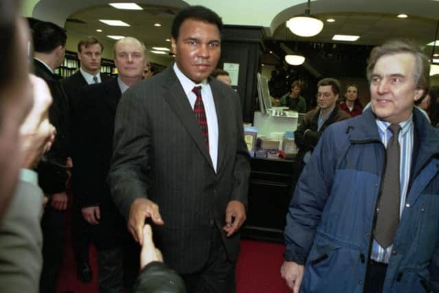 Muhammad Ali arrives at Waterstone's book shop in Edinburgh, for a book signing in November 1993. Picture; TSPL