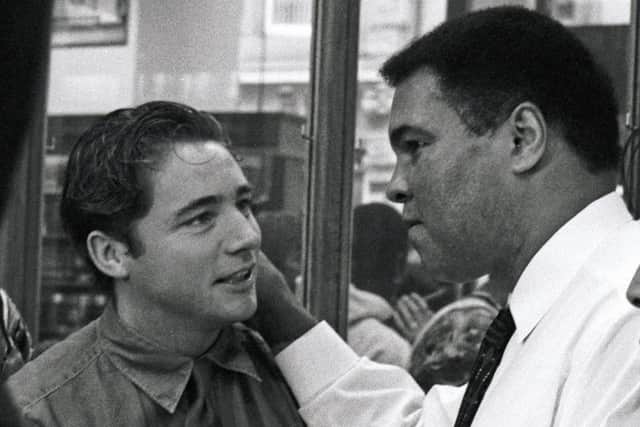 Muhammad Ali at the Glasgow book signing in 1993 with Ally McCoist. Picture: Wattie Cheung