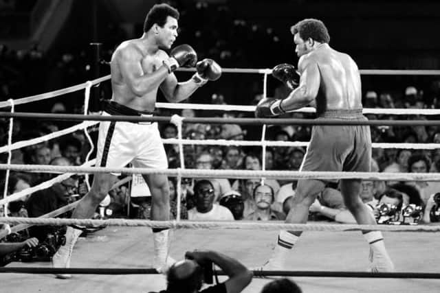 At the age of 32 Ali won back the world title from George Foreman in the 'Rumble in the Jungle' in Kinshasa, Zaire, in 1974. Picture: AFP/Getty Images
