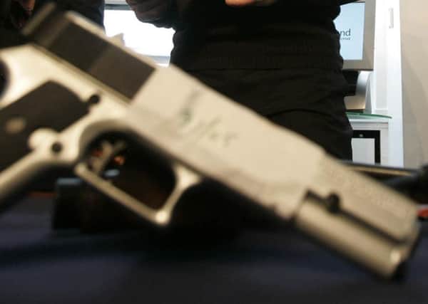 An old revolver was recovered from a drained loch in Fife and handed in to police. Picture: PA