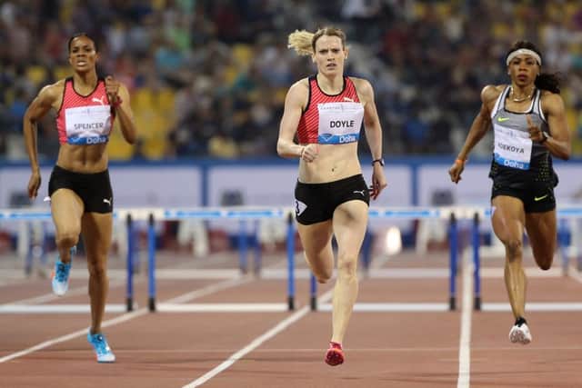 Eilidh Doyle crosses the finishing line to win the women's 400 metres hurdles final  at the Diamond League athletics meeting  in Doha. Picture: Getty Images)