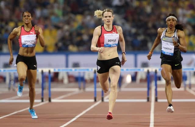 Eilidh Doyle crosses the finishing line to win the women's 400 metres hurdles final  at the Diamond League athletics meeting  in Doha. Picture: Getty Images)