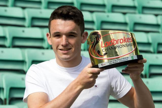 John McGinn shows off his award today