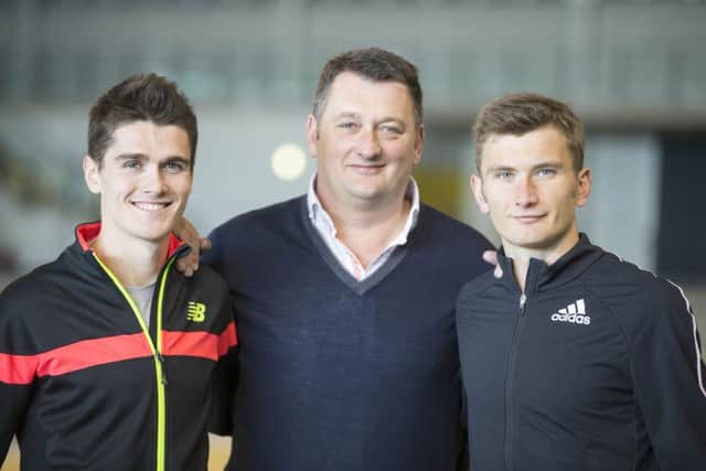 Callum Hawkins, left, with brother Derek and dad Robert after they won selection for the British Olympic marathon team. Picture: Jeff Holmes