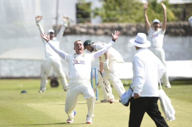 Carlton celebrate on their way to victory on Saturday as Watsonians Andrew Learmonth is trapped leg before wicket. Picture: Greg Macvean