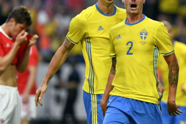 Sweden's Zlatan Ibrahimovic and Mikael Lustig, right, celebrate after Lustig scored. Picture: AP