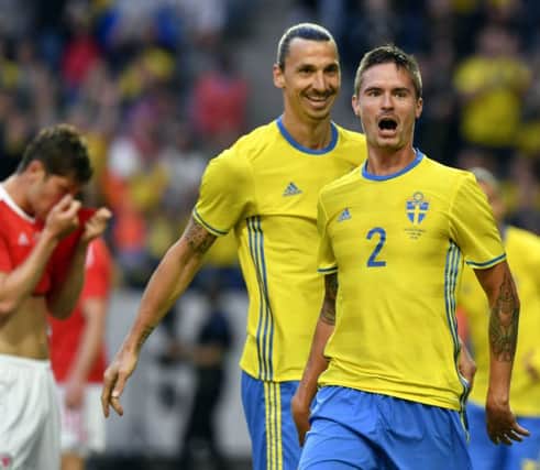Sweden's Zlatan Ibrahimovic and Mikael Lustig, right, celebrate after Lustig scored. Picture: AP