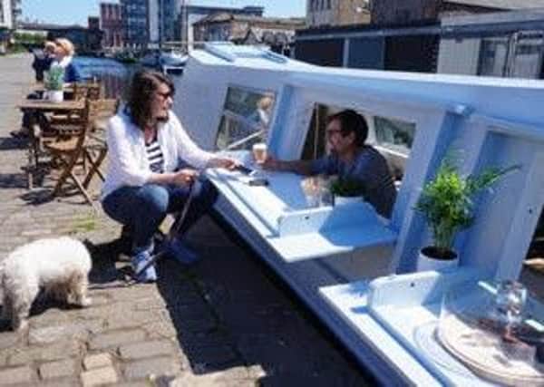 Ali and Sally McFarlane said they saw the barge for sale last year and just fell in love with it. Picture: Contributed