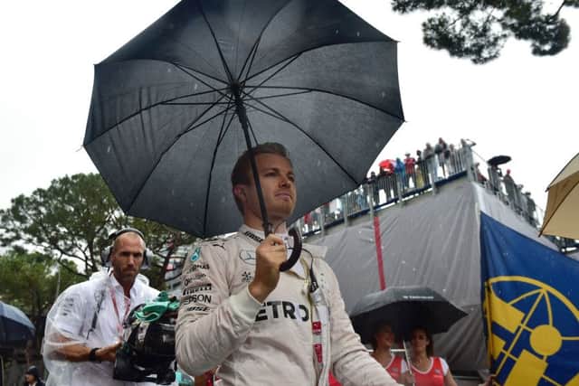 Mercedes driver Nico Rosberg walks on the grid at the Monaco street circuit. Picture: ANDREJ ISAKOVIC/AFP/GETTY