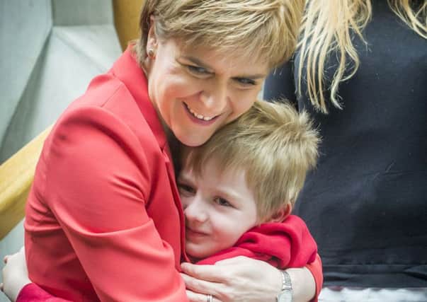 Nicola Sturgeon meets Lachlan Brain and his mother as the Australian family battle the Home Office in their bid to remain in what they now call home. Picture: PA