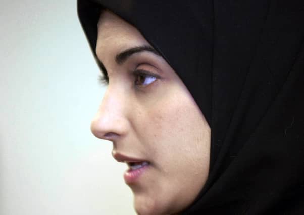 It is hoped the introduction of the hijab will help attract Muslim women to join the police force. Picture: AP