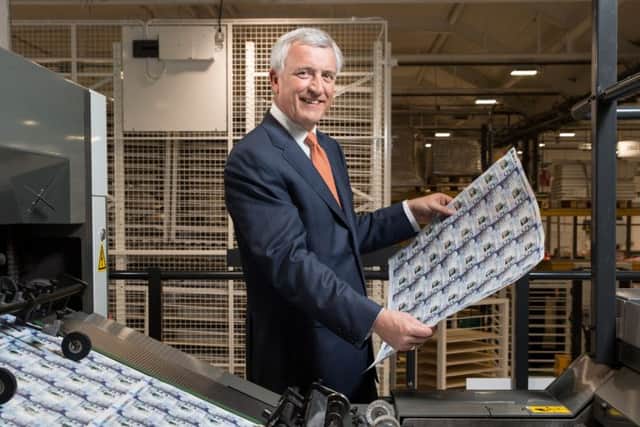 Clydesdale chief David Duffy checks the notes at De La Rue's printing plant. Picture: Contributed