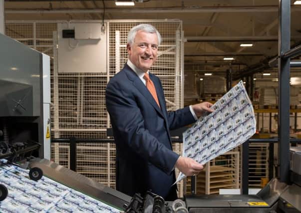 Clydesdale chief David Duffy checks the notes at De La Rue's printing plant. Picture: Contributed