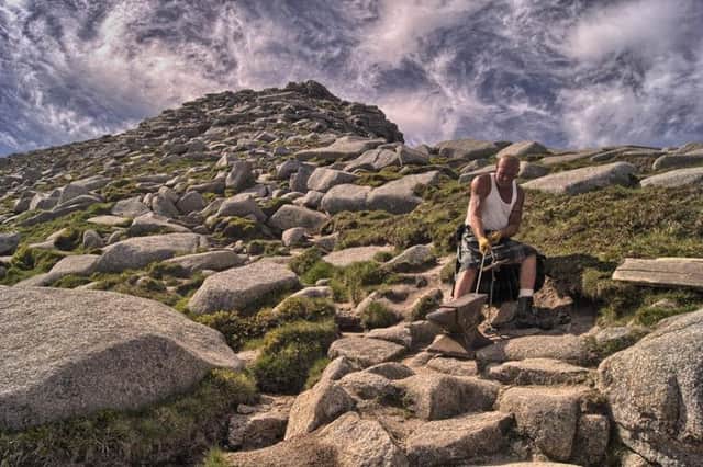 Davy Ballantyne on Goatfell. The 54-year-old hauled a 19-stone anvil to the top of the mountain. Picture: Big Davy's Anvil Challenge/Facebook