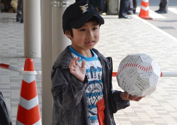 Yamato Tanooka says he wants to play baseball and go back to school. Picture: AFP/Getty Images
