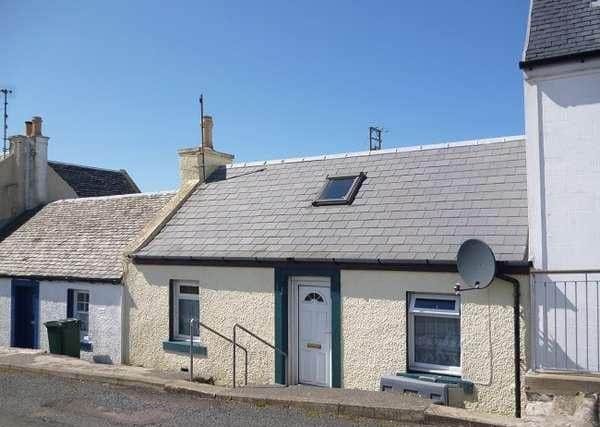 This pretty cottage in Portnahaven on Islay is on the market for Â£80,000. It has two bedrooms and views to the harbour and lighthouse. The cottage could do with some upgrading but the price reflects that. Contact GSPC on 01475 327972.
