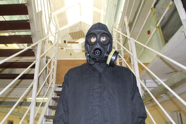A model SAS officer dressed in the "Black Kit" like that worn during the rescue of Peterhead Prison officer Jackie Stuart in 1987.
