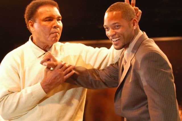 Will Smith, pictured with Muhammad Ali, will be among the pall-bearers at Fridays funeral. Picture: Contributed