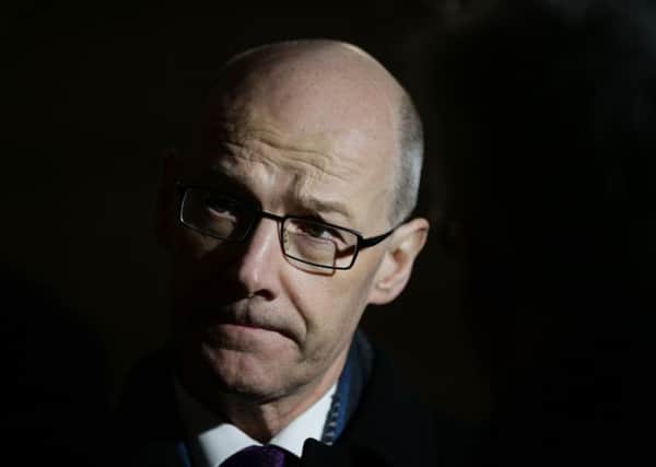 John Swinney has insisted the Scottish Government remains 'absolutely committed' to the Named Person plans. Picture: Yui Mok / PA