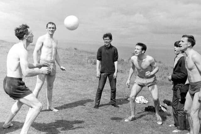 Hearts first team players enjoy a break from training at Gullane beach in East Lothian in August 1965. Picture: TSPL
