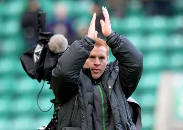 Then 
Celtic manager Neil Lennon applauds the travelling  fans at full time after a 4-0 win at Easter Road in 2014. Picture: Craig Williamson