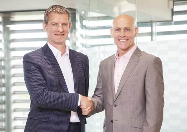 Onyx chief executive Neil Stephenson, left, shakes hands on the deal with Pulsant boss Mark Howling. Picture: Contributed