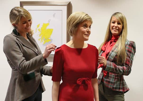 The First Minister wears  a Totty Rocks outfit. Picture: Allan Milligan