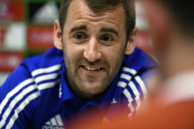 Niall McGinn played a key role in Northern Irelands Euro 2016 qualification but is unlikely to start their first match against Slovakia. Picture: Getty