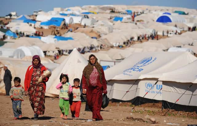 Syrian refugees seen at a temporary campsite. Picture: Getty Images