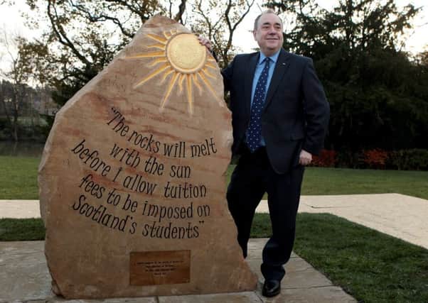 Alex Salmond unveils the commemorative stone at Heriot-Watt University in Edinburgh on 18 November, 2014. Picture: SWNS