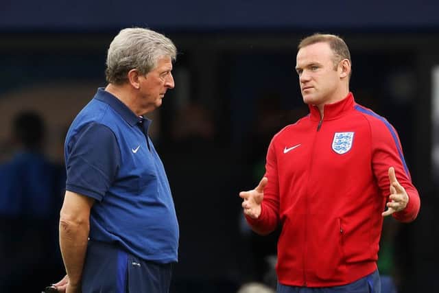 England manager Roy Hodgson chats to Wayne Rooney on the pitch at Marseille's Stade Velodrome. Picture: PA
