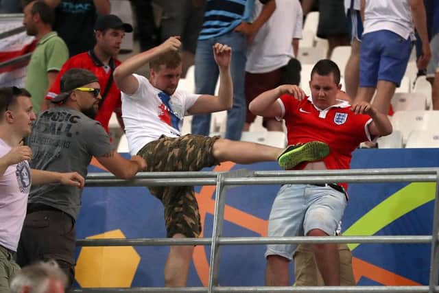 Tempers flare in the stands between Russia and England fans. Picture: Nick Potts/PA Wire