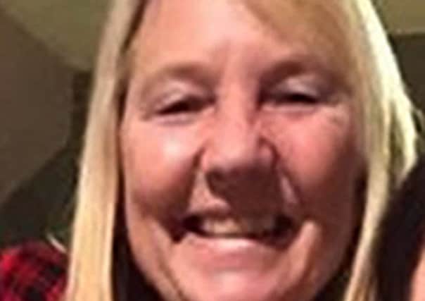 Andrena Douglas, 53, as murder probe detectives are now linking the death of a woman whose body was found at her Ayrshire home to a nearby fire which critically injured her partner. Picture: PA