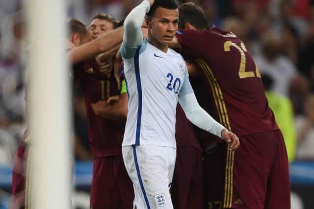 Dele Alli turns away in disappointment after Vasili Berezutski scored the equalising goal for Russia on Saturday. Picture: Getty Images