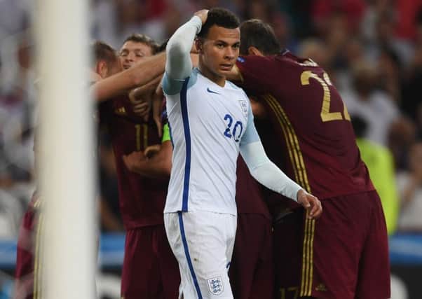 Dele Alli turns away in disappointment after Vasili Berezutski scored the equalising goal for Russia on Saturday. Picture: Getty Images