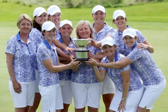 Elaine Farquharson-Black, front row centre, celebrates with her Great Britain & Ireland players. Picture: Getty Images