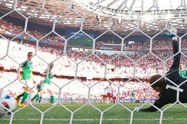 Hamilton Accies Michael McGovern cant keep out Arkadiusz Miliks second-half strike. Picture: AFP/Getty Images