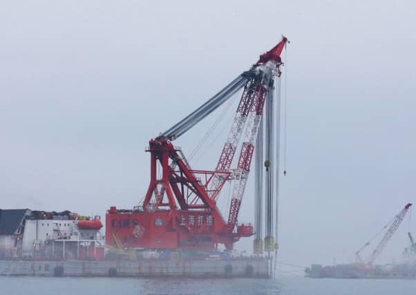 Officials have said the challenge will be to raise the Sewol without the ferry breaking up. Picture: AFP/Getty Images