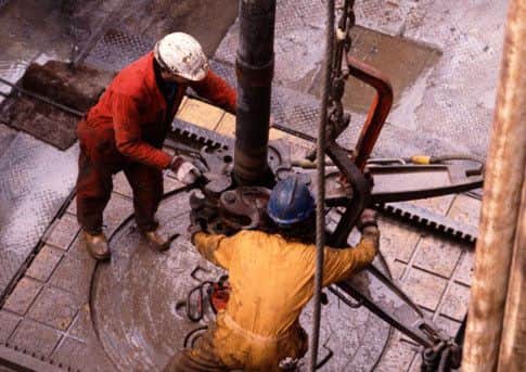 Out-of-work oil workers being urged to retrain as teachers.
