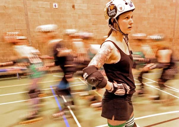 Dr Breeze both studied  and played for roller derby team. Picture: Phil Wilkinson