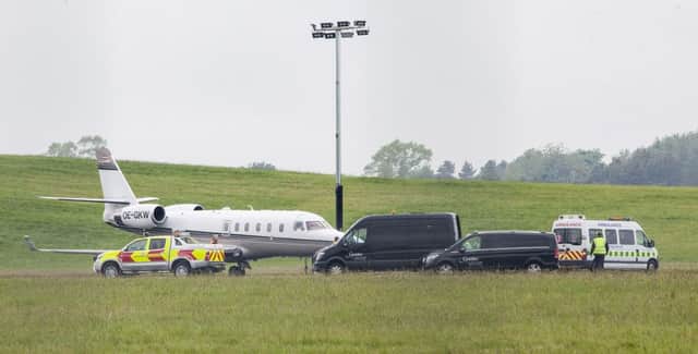 Stephanie Inglis arrives at Edinburgh Airport where she was met by an ambulance. Picture: SWNS