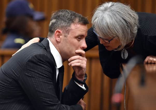 Oscar Pistorius was present in court, as were the parents of his girlfriend Reeva Steenkamp, who he has been convicted of murdering. Picture: AFP/Getty Images