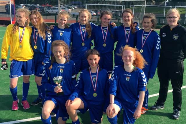 High School of Glasgow Under 15s girls seven-a-side title winning squad: back from left, Emily Taylor, Sarah Turnbull, Emily Sillars, Helena Gronski, Mhairi Crooks, Christina Miller, Jennifer Cuthill, girls football coach and chemistry teacher, Mhari Peek; front from left, Lucy Williamson, Yesmi Edgar, Georgia Cross.