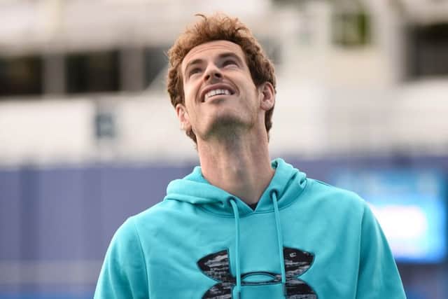 Andy Murray looks skywards as rain delays proceedings at Londons Queens Club yesterday. Picture: Getty