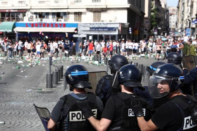 England fans clash with police prior to the match with Russia on Saturday, June 11. Picture: Getty