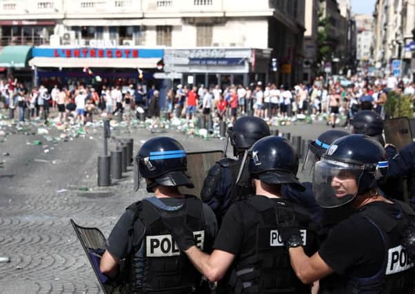 England fans clash with police prior to the match with Russia on Saturday, June 11. Picture: Getty