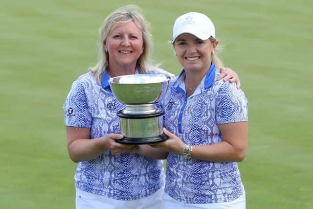 Bronte Law holds the Curtis Cup with her captain Elaine Farquharson-Black. Picture: Getty